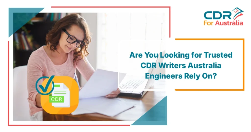 Professional woman reviewing documents on a laptop while preparing an engineering report with the help of trusted CDR Writers Australia.
